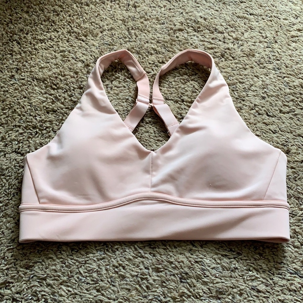 Light pink sports bra by fabletics size small